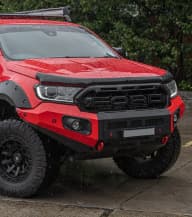 Front view of a red ute fitted with an EGR CrossTrac bullbar
