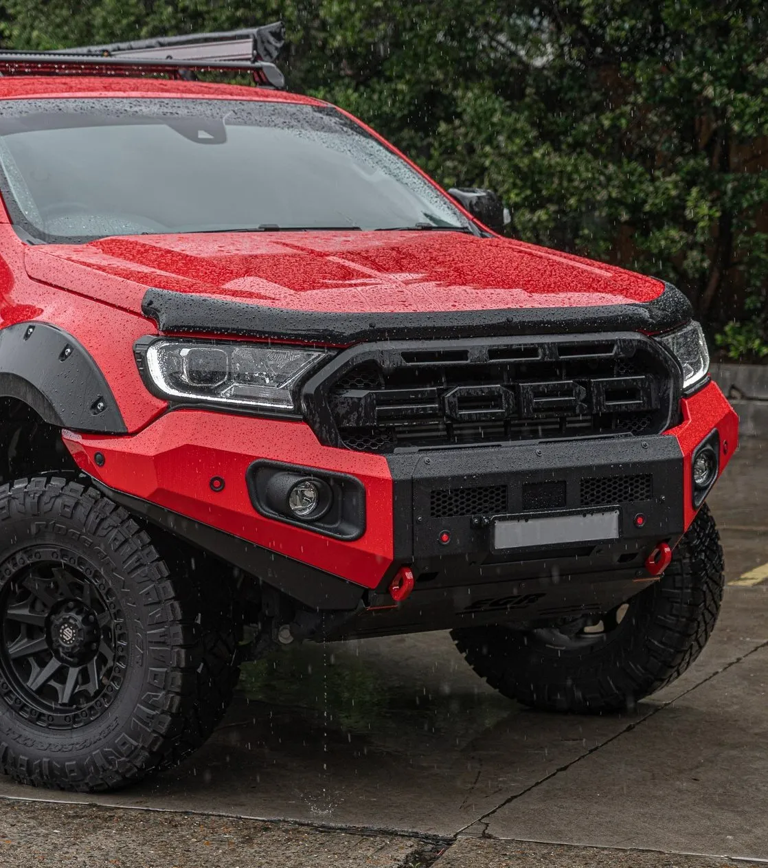 Front view of a red ute fitted with an EGR CrossTrac bullbar