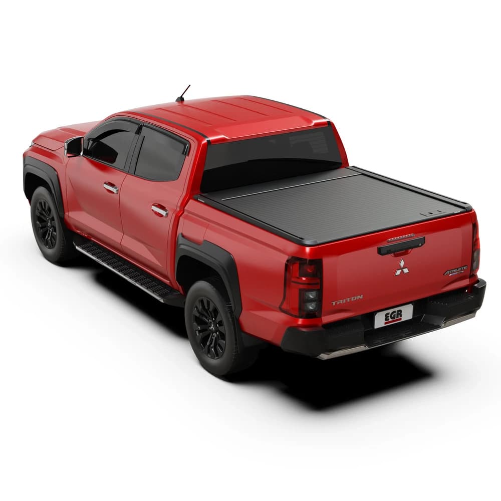 Rear-side three-quarter view of a Mitsubishi Triton MQ/MR equipped with the EGR Auto RollTrac Manual Roller Cover