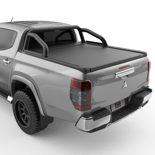 Mitsubishi Triton MQ/MR fitted with EGR RollTrac Sports Bar, rear three-quarter view showing black powder-coated aluminium bar integrated with RollTrac cover